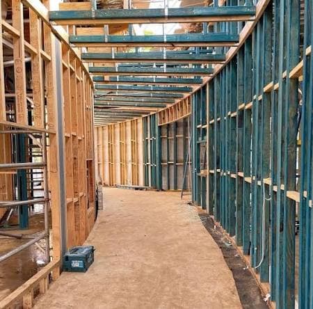 Steel and timber framing corridor on a construction site